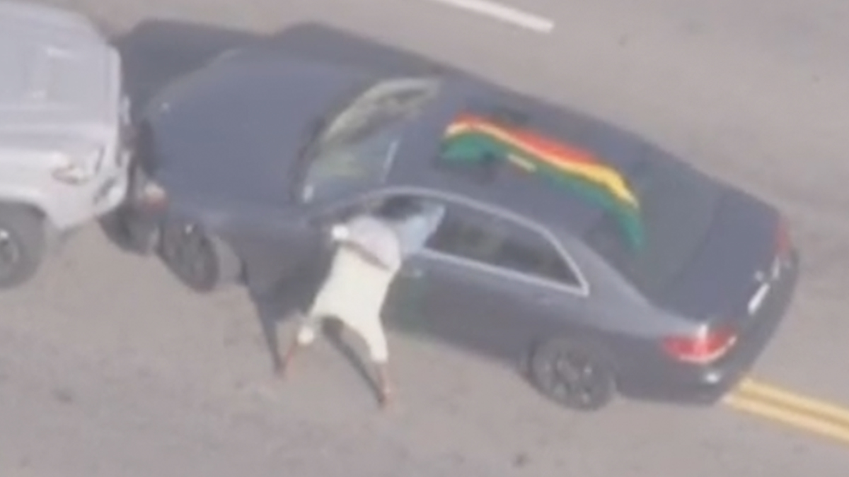 "Wild Police Chase: Stolen Vehicle Driver Stuck Upside Down in South LA"