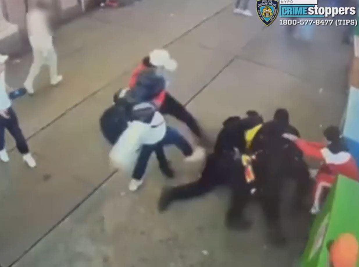 "NYPD Officers Attacked by Migrant Mob in Times Square, Suspects Freed Without Bail: Shocking Video"