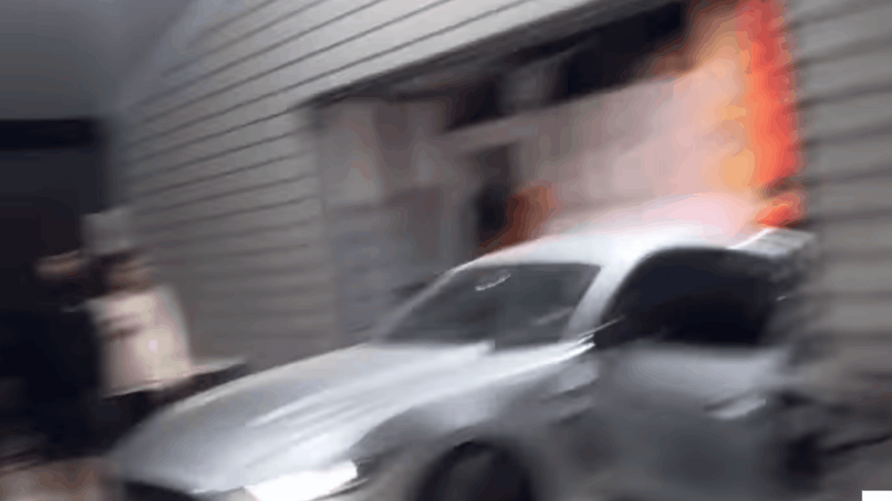 Featured image for Mustang Driver's Reversing Mishap Leads to Garage Smash and Donut Disaster.