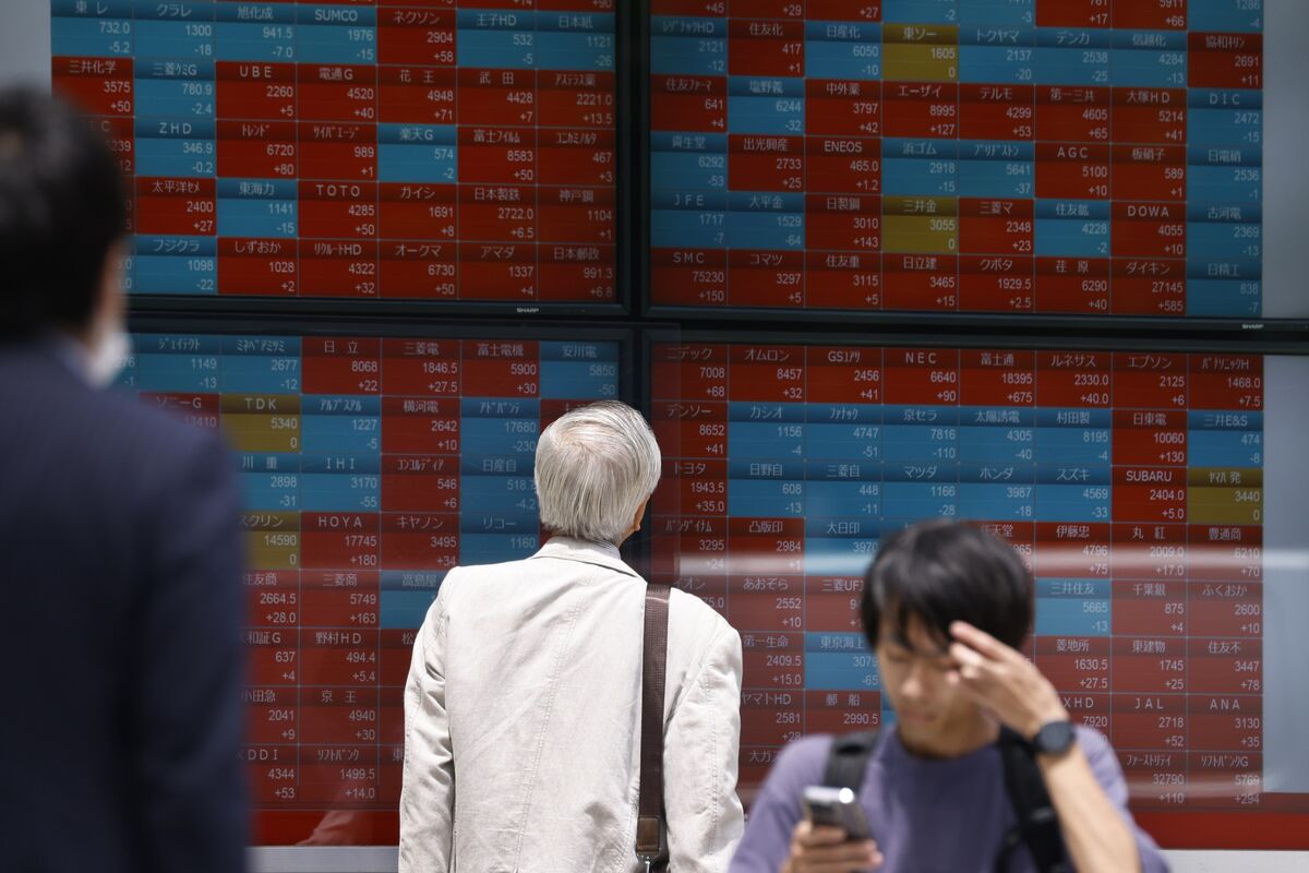 "Hong Kong Stocks Surge as Asian Markets Rally on Strong Economic Data and Tech Sector Gains"