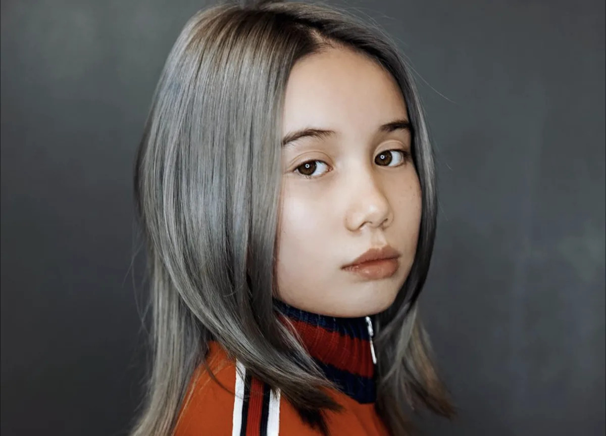 Featured image for Lil Tay's Death Hoax Debunked: Child Rapper and Brother Confirmed Safe