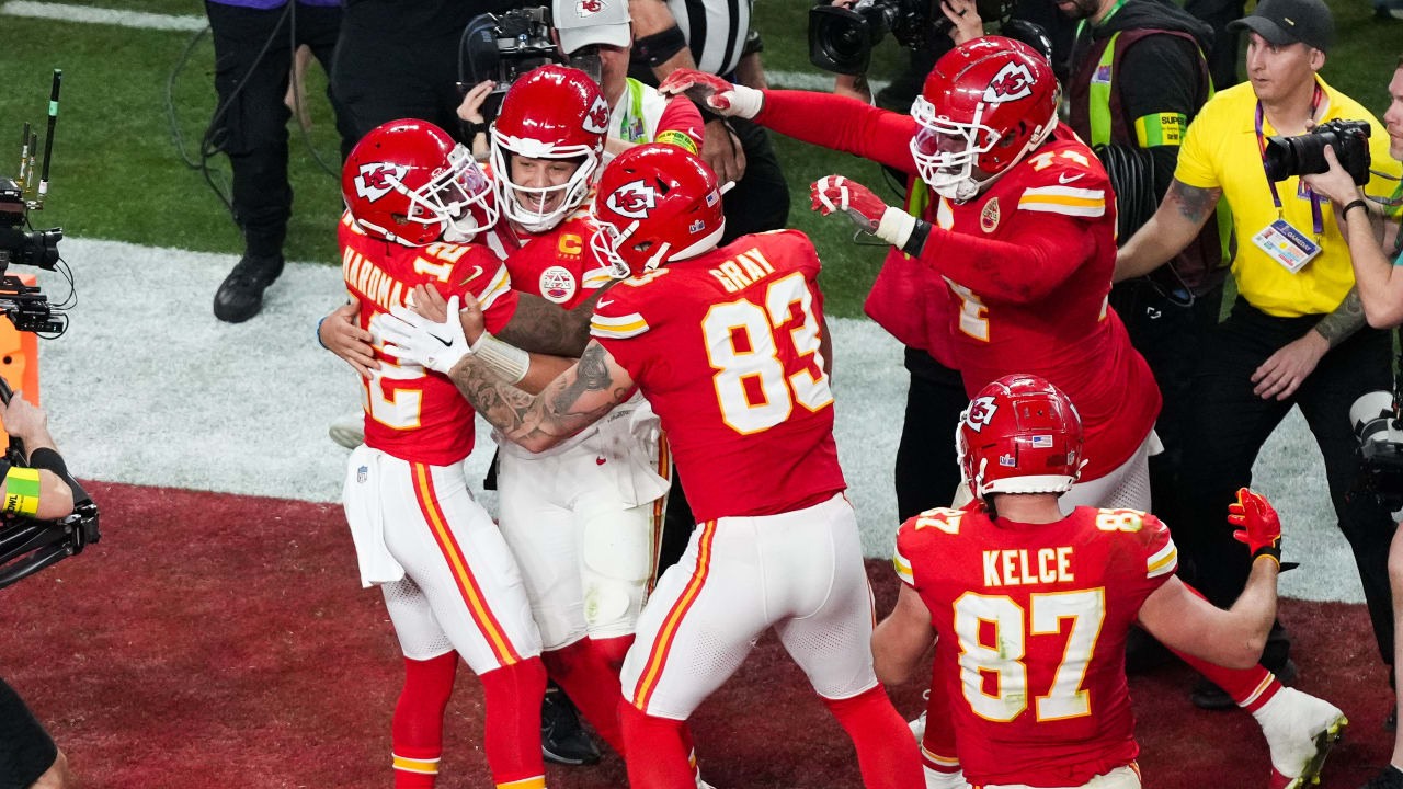 "Mahomes Leads Chiefs to Overtime Victory in Super Bowl LVIII"