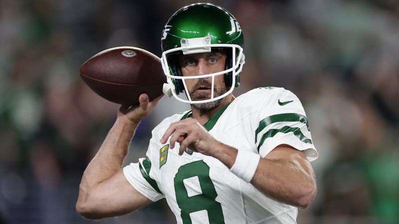 Aaron Rodgers' Season Ends with Achilles Tear, Sparking Controversy over Artificial Turf