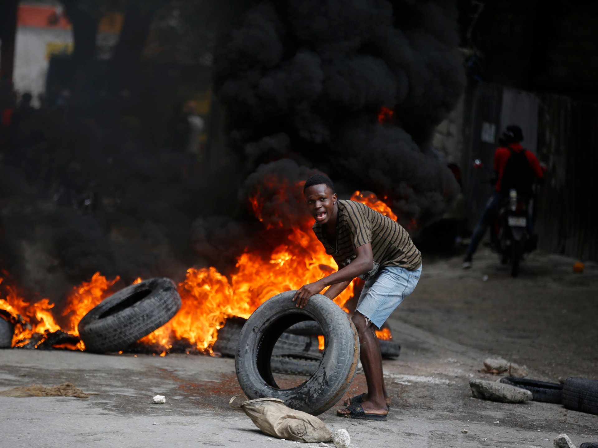 "Haiti's Escalating Crisis: Gangs Threaten Coup and Anarchy"