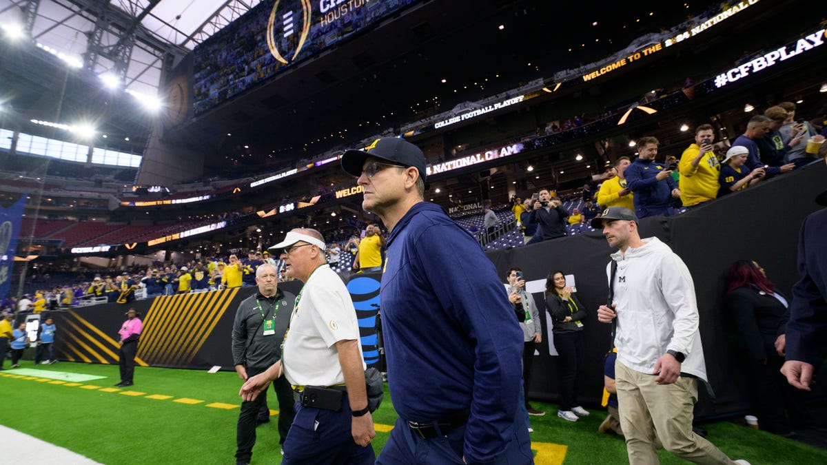 "Harbaugh Brothers Unite on National Championship Sideline"