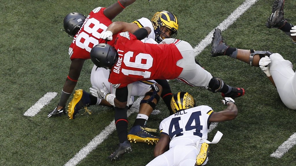 "Jim Harbaugh's Triumph: Overcoming Adversity to Claim College Football's Ultimate Prize"