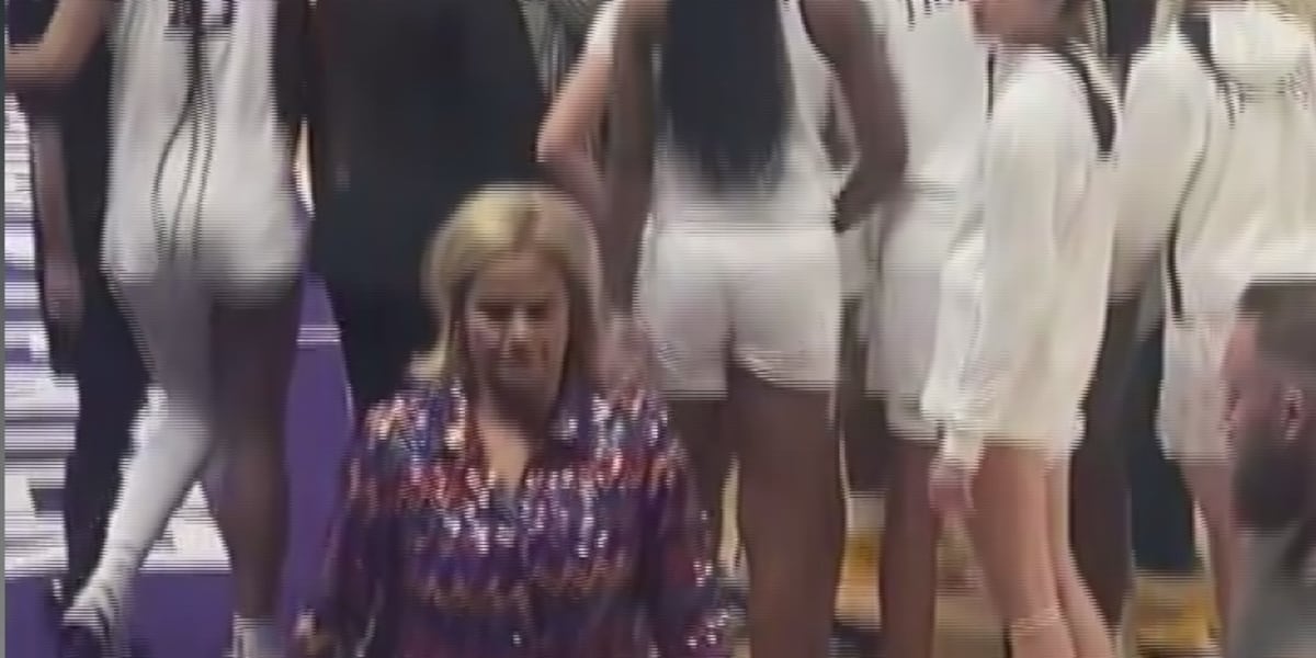 Featured image for "Explosive Ejection: LSU Coach Mulkey Held Back by Angel Reese in Intense Game"