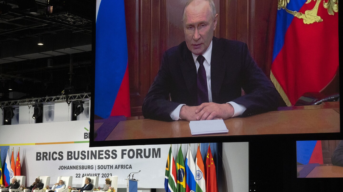 "Putin's Strong Opposition to Sanctions on Russia Echoes at South Africa Economic Summit"