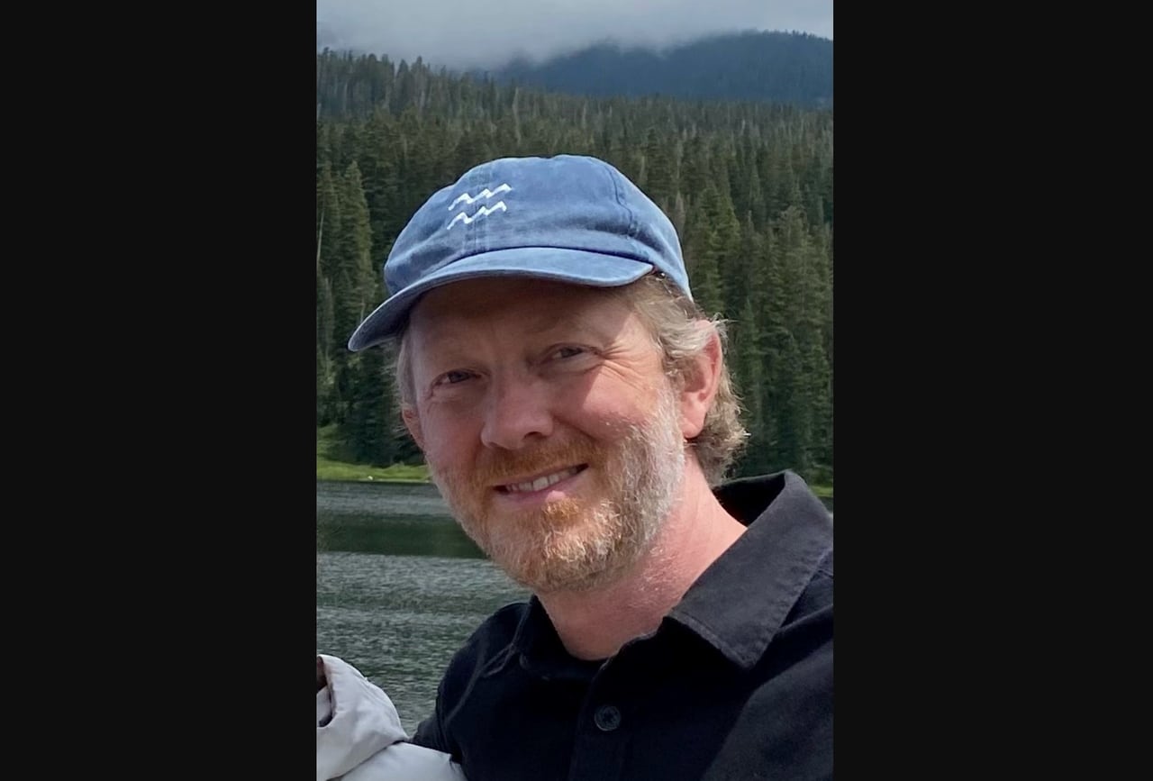 Police identify slain cab driver as 43-year-old artist and musician.