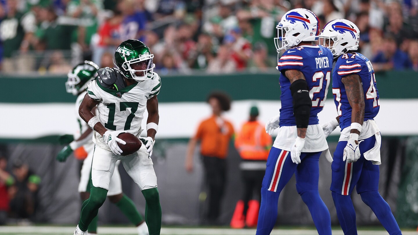Featured image for "Garrett Wilson's Spectacular TD Catch Steals the Show in Jets' Tie with Bills"