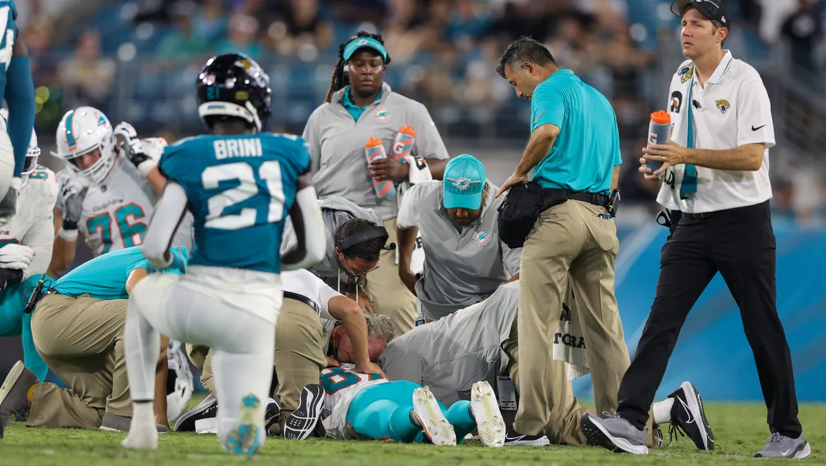 Injury Suspends Dolphins-Jaguars Game, Positive Update on Daewood Davis