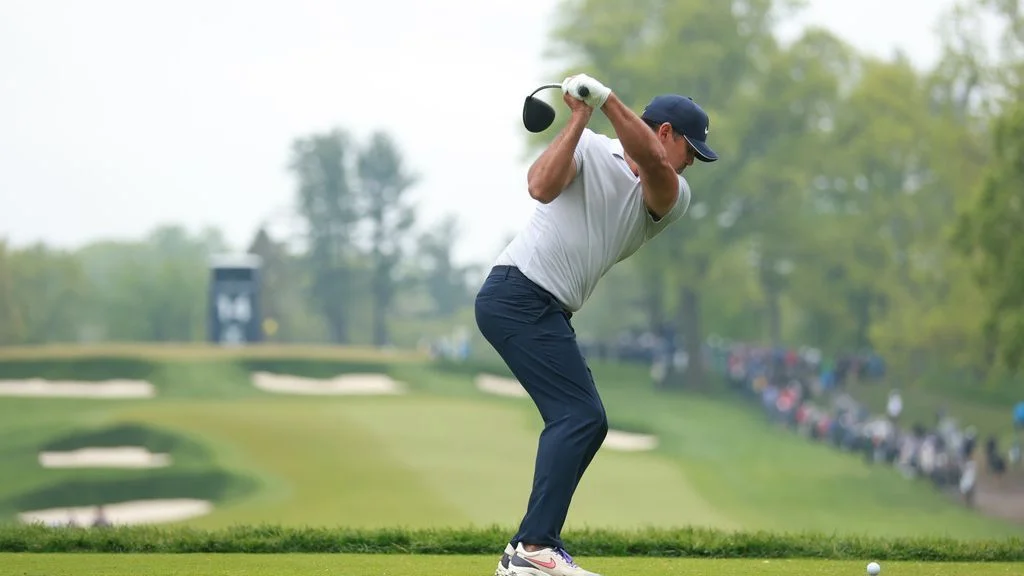 "Koepka dominates rainy round to lead PGA Championship"
