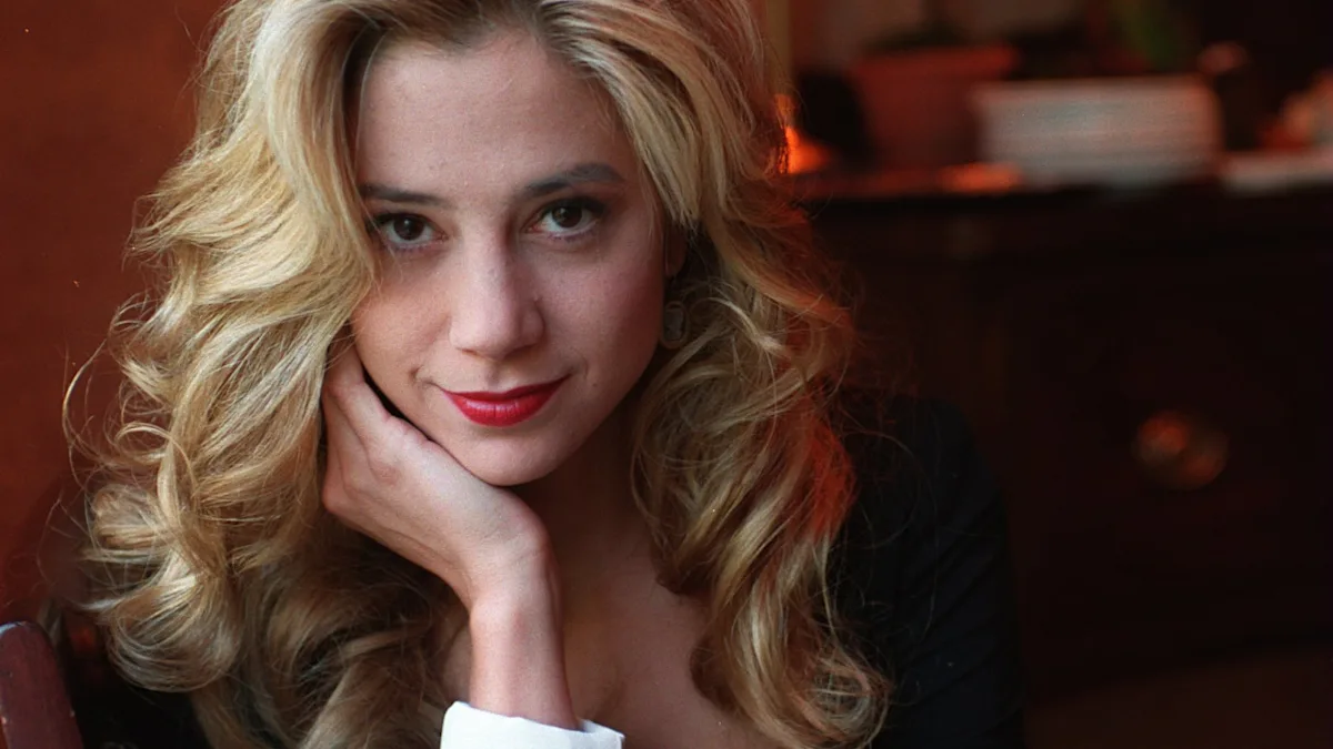 Featured image for Oscar Winner Mira Sorvino Stuns as the Most Beautiful Santa Claus