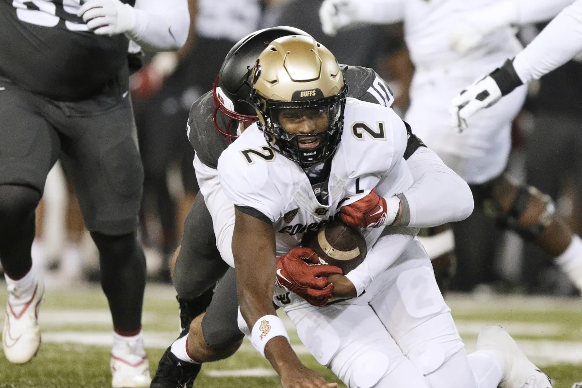 "Colorado QB Shedeur Sanders Injured in Blowout Loss to Washington State"