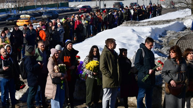 Featured image for "Mourners Queue to Honor Navalny at Moscow Grave, Symbol of Hope for Democratic Russia"