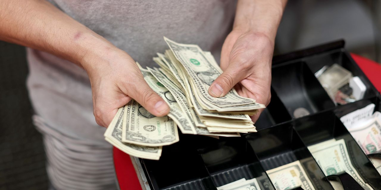 Dollar deflates as air escapes.