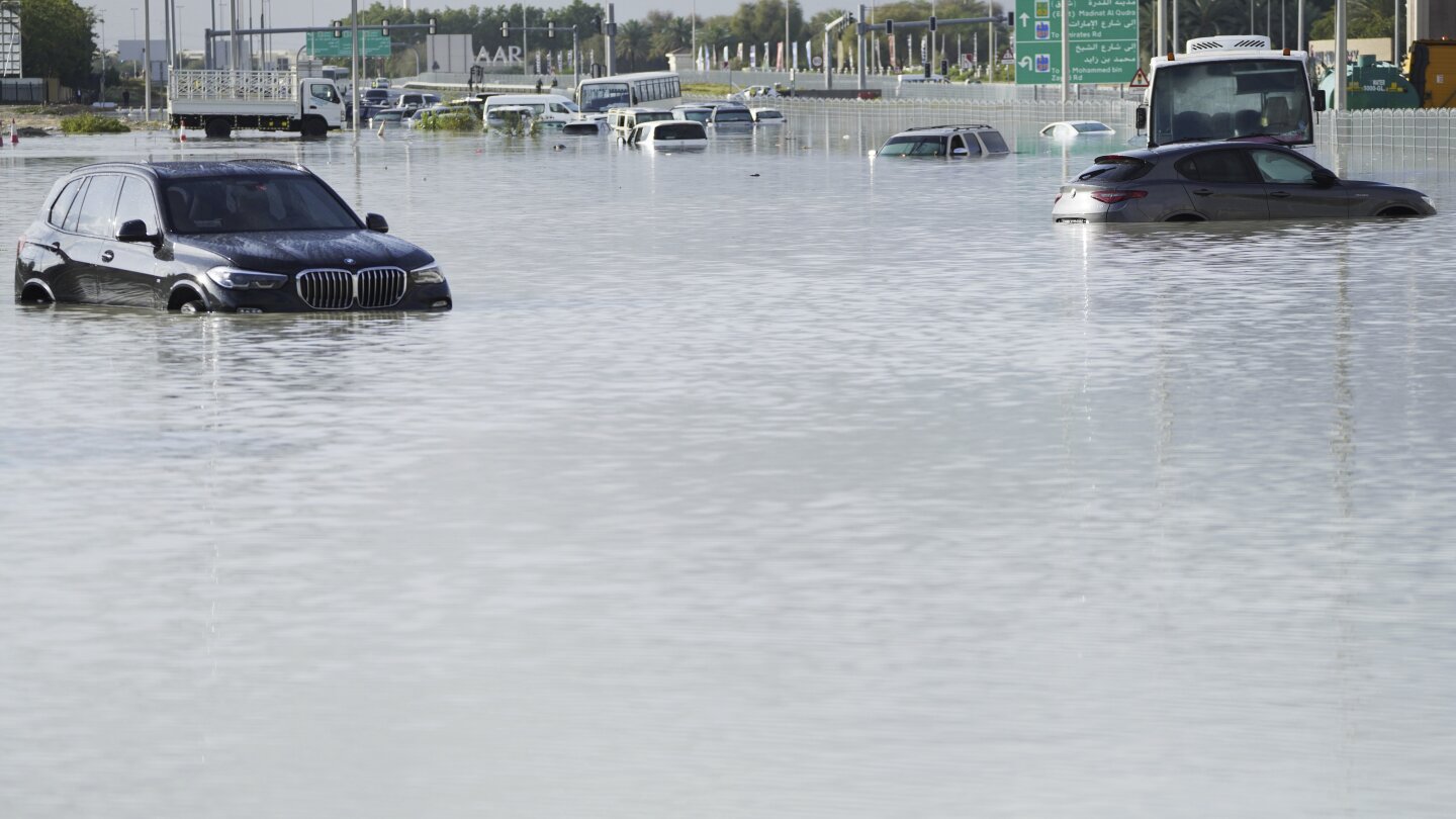 "Record Rainfall Causes Chaos and Flooding in Dubai, Disrupting Flights and Daily Life"