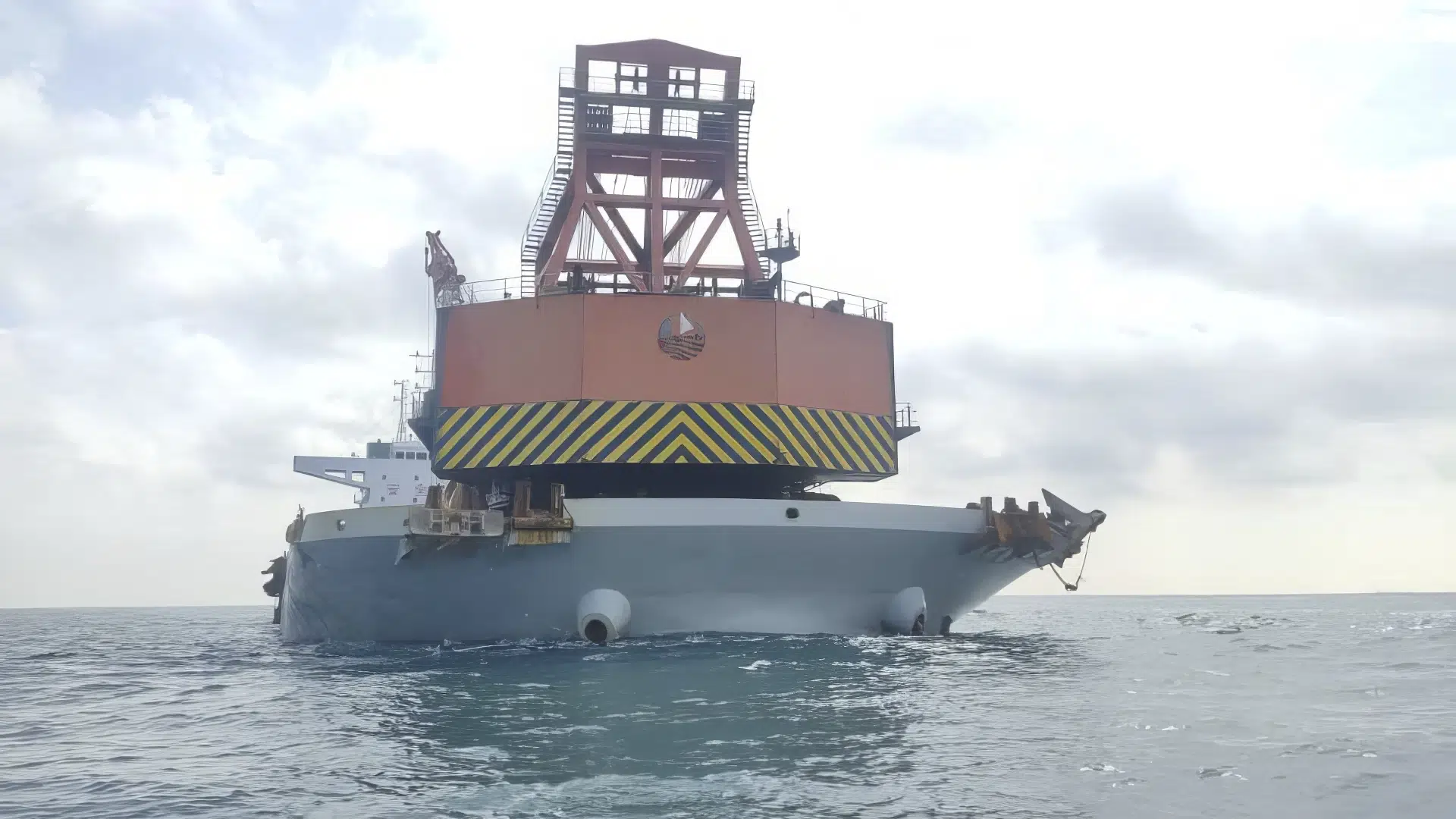 Malaysia detains Chinese barge for looting British WWII wrecks.