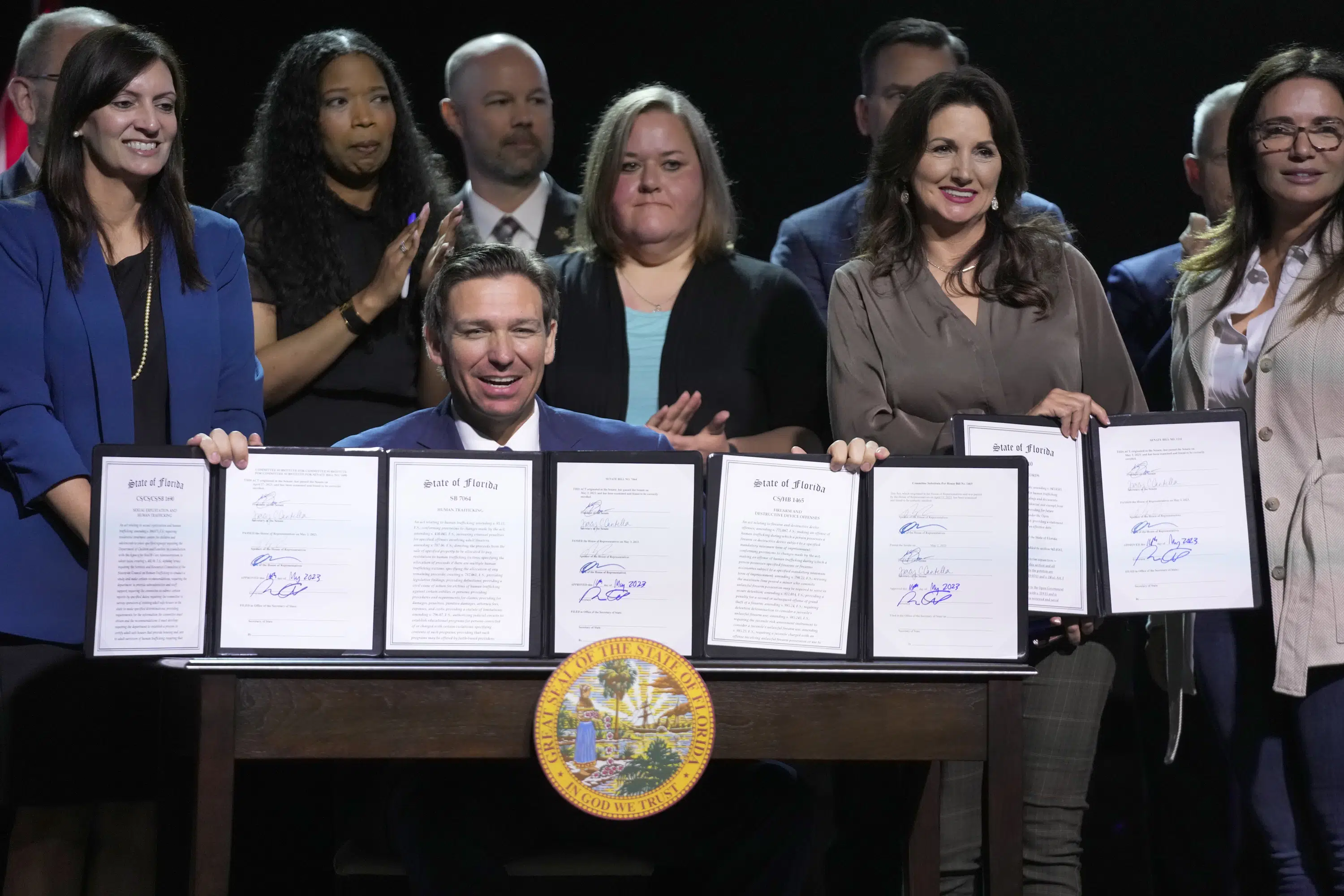 Florida Governor DeSantis signs controversial bills targeting LGBTQ+ community and ESG initiatives.
