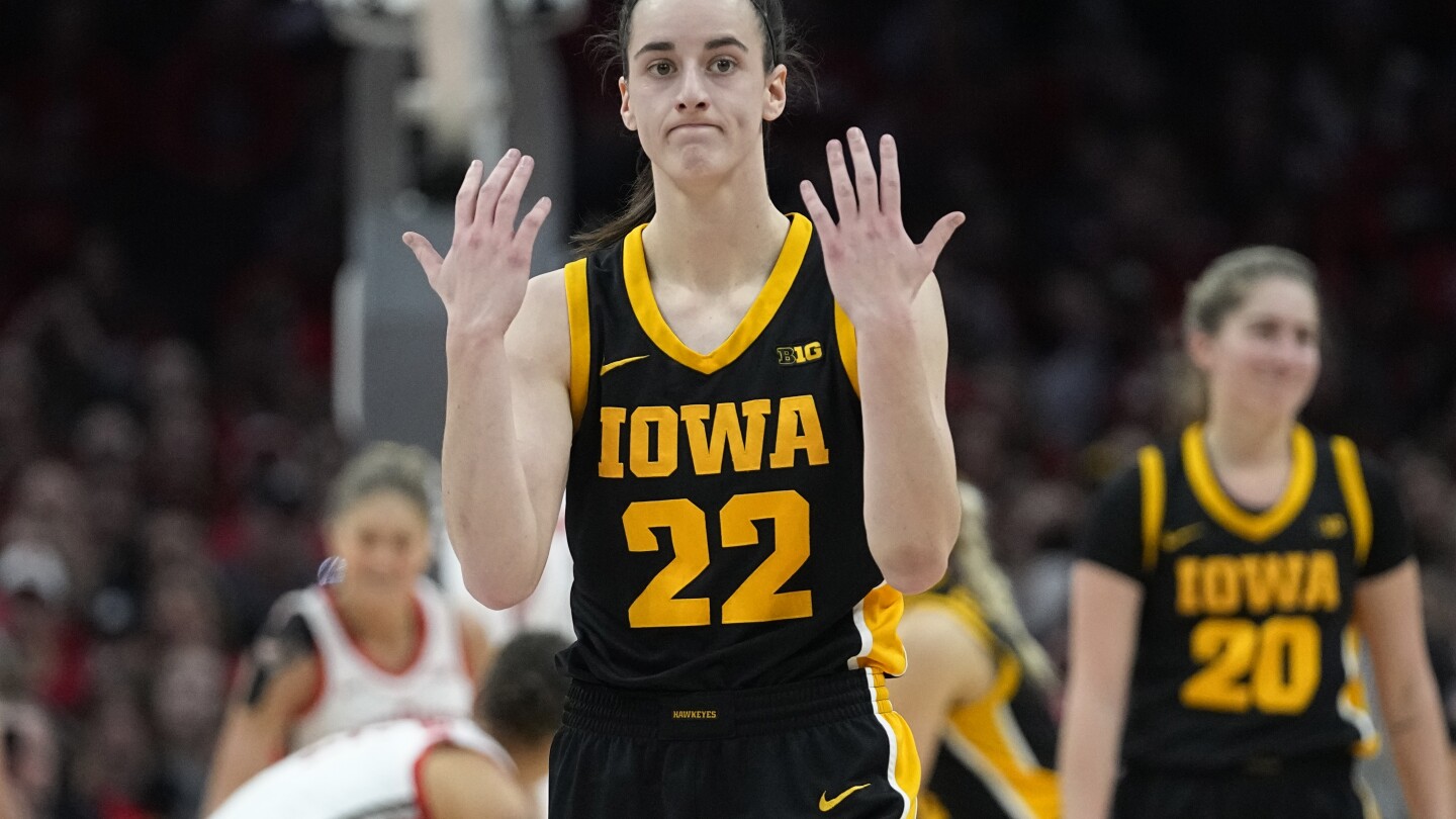 "Iowa's Caitlin Clark Collides with Ohio State Fan in Court Storming Incident"