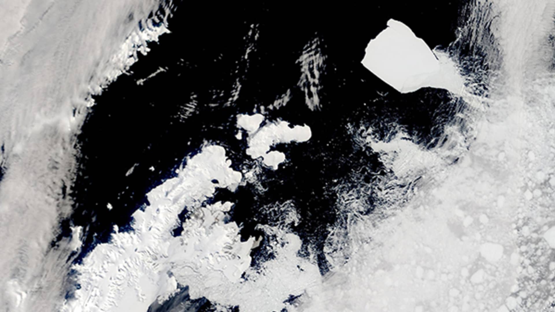 "Massive iceberg breaks free, scientists analyze its significance"
