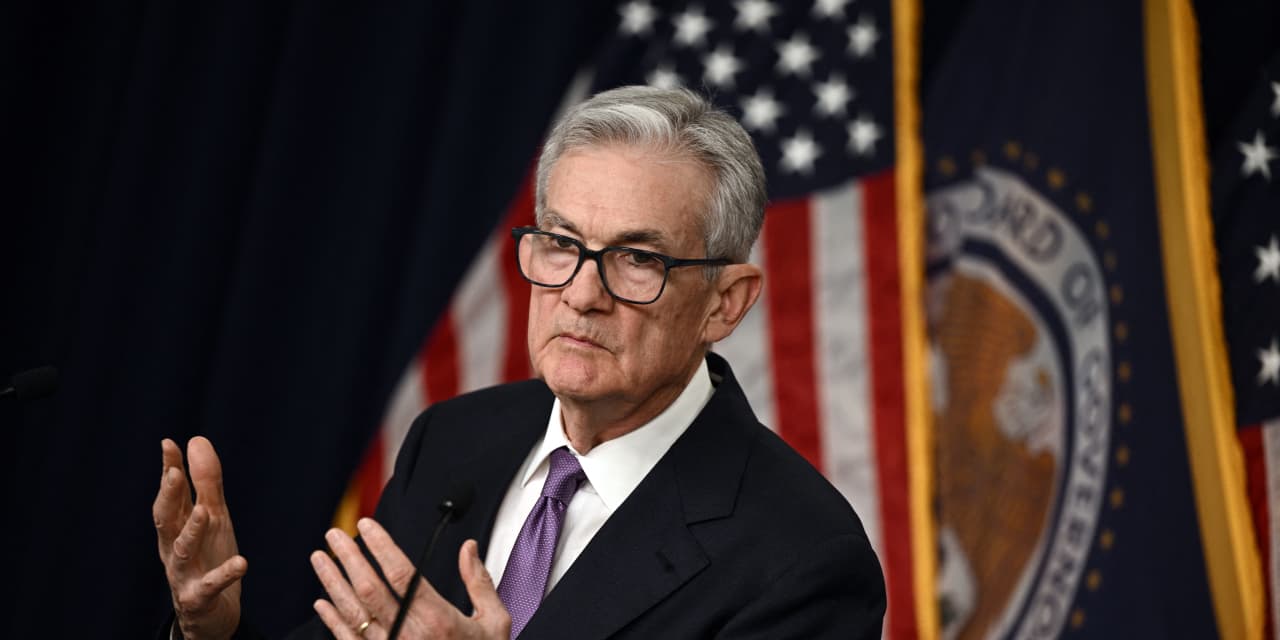 "Fed's Signal on Rates Triggers Slide in U.S. Stocks"