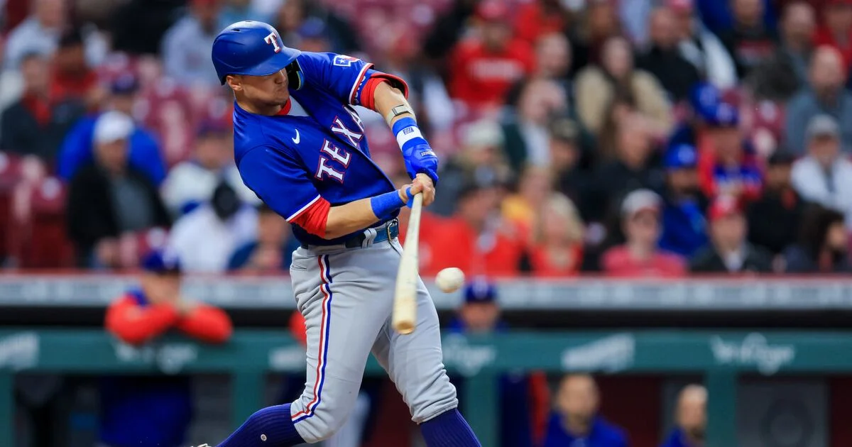 Rangers' Josh Jung injured in loss to Reds.