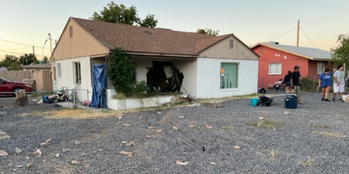 Stolen car driver arrested after crashing into Glendale home and police cruiser.