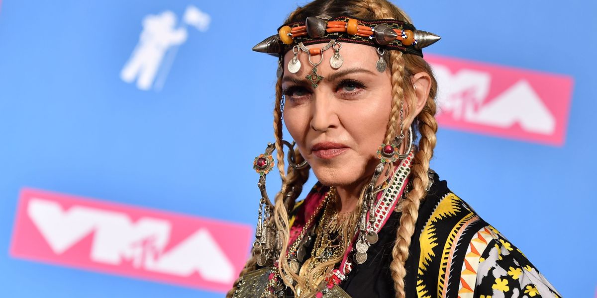 Featured image for "Madonna's Revelation: Her One Word for God After Emerging from Coma"