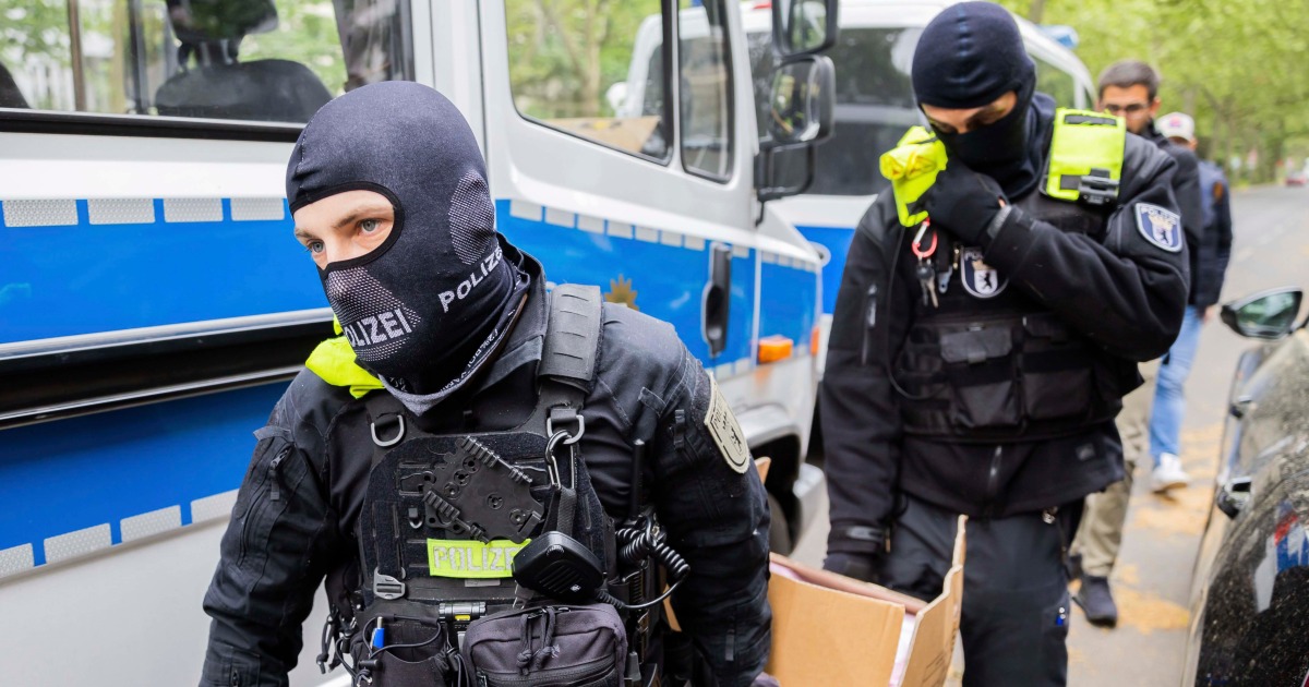 Featured image for German police conduct nationwide raids on climate activists.