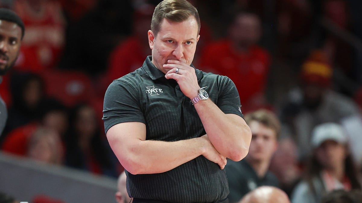 Featured image for "T.J. Otzelberger's Impact: From Polo Shirts to Elite Eight"