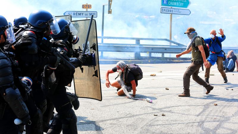 Violent clashes erupt over French-Italian rail link project.