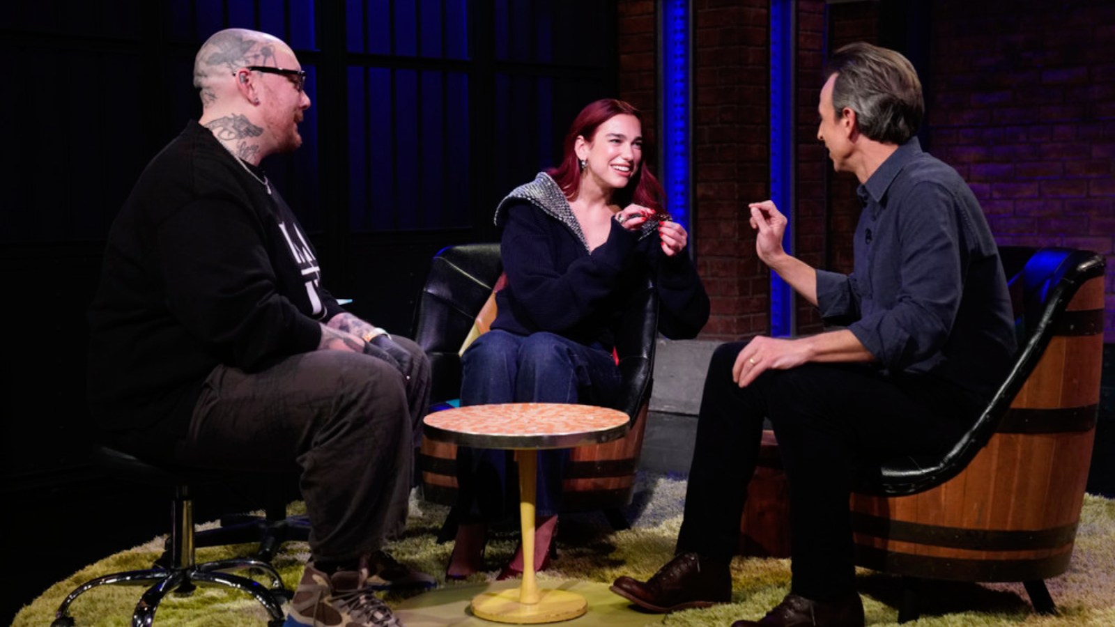 "Dua Lipa and Seth Meyers Bond Over Shots and Matching Tattoos"