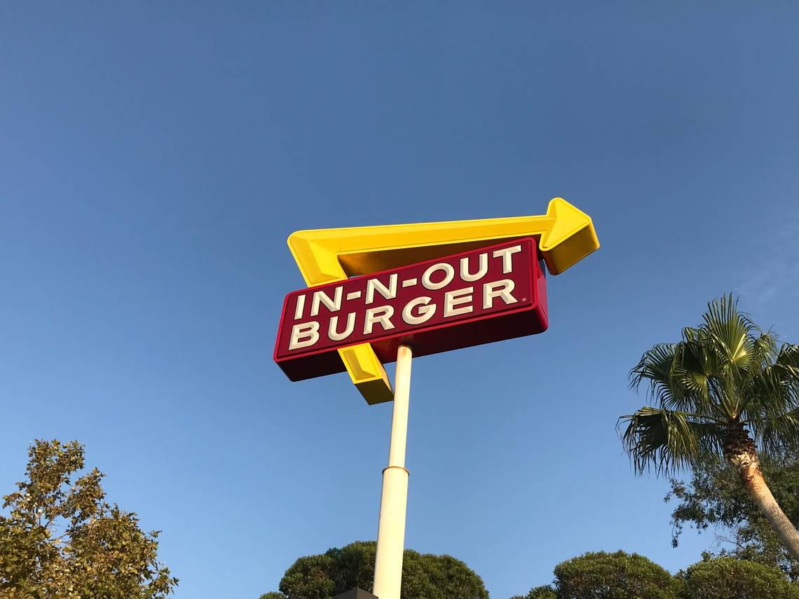 Chaotic road-rage incident at In-N-Out drive-thru captured on video.