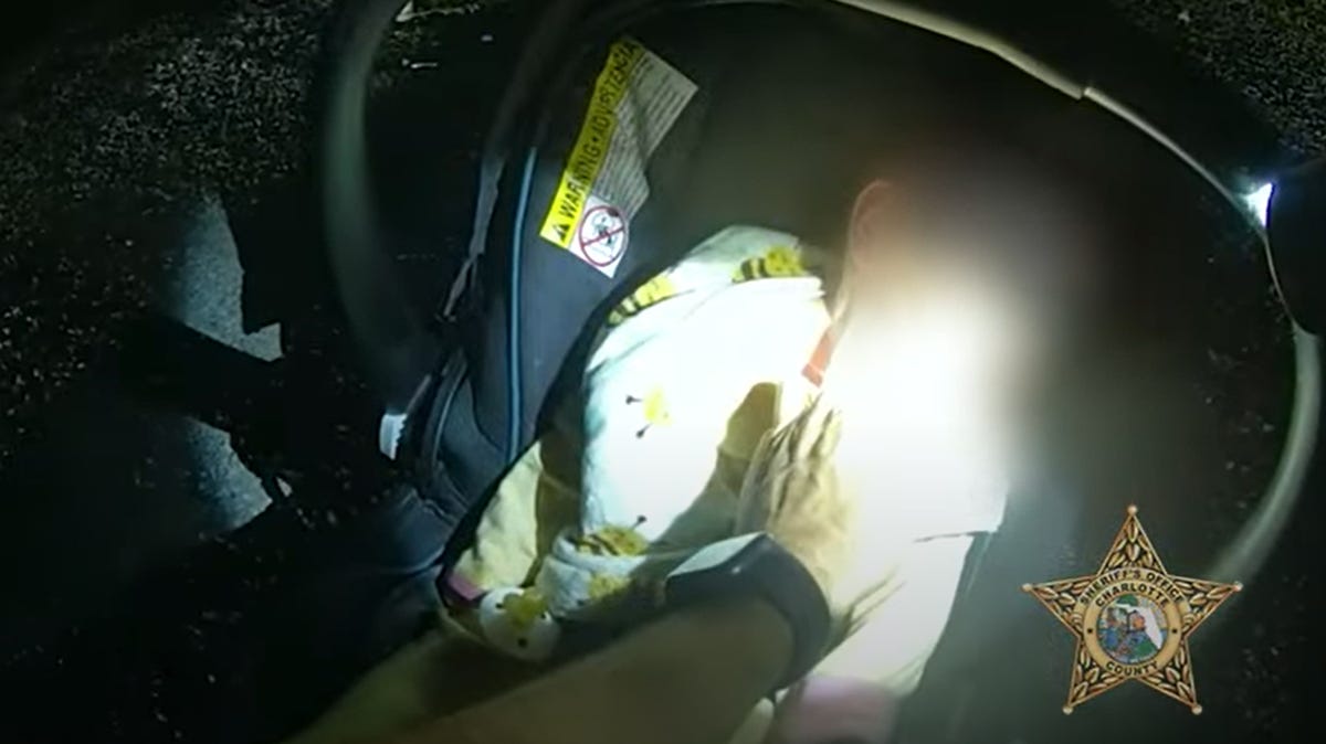 "Florida Deputy's Dramatic Rescue of Unconscious Baby Trapped in Car Crash"