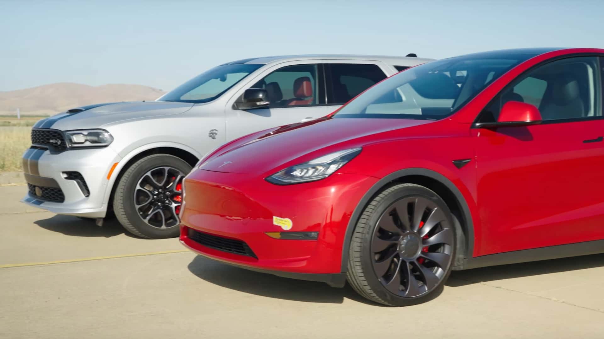 Dodge Durango Hellcat vs. Tesla Model Y Performance: The Ultimate U-Drag Showdown