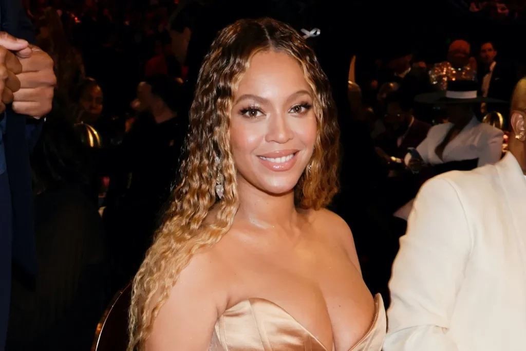 Beyoncé Stuns in Sheer Gold Dresses and Towering Heels at Oscars After-Party.