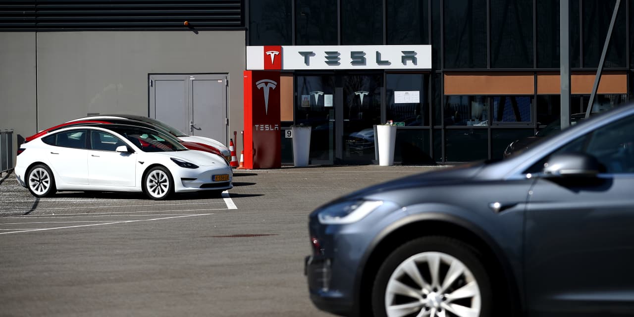 Featured image for Tesla's Record-Breaking EV Deliveries and Stock Performance Await