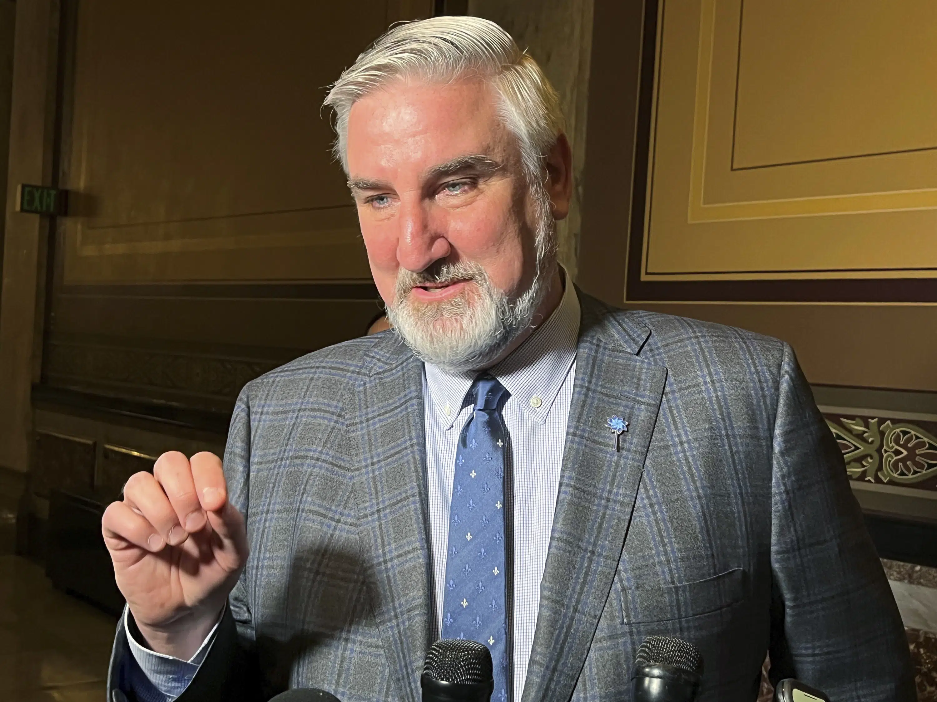 Indiana governor outlaws gender-affirming health care.