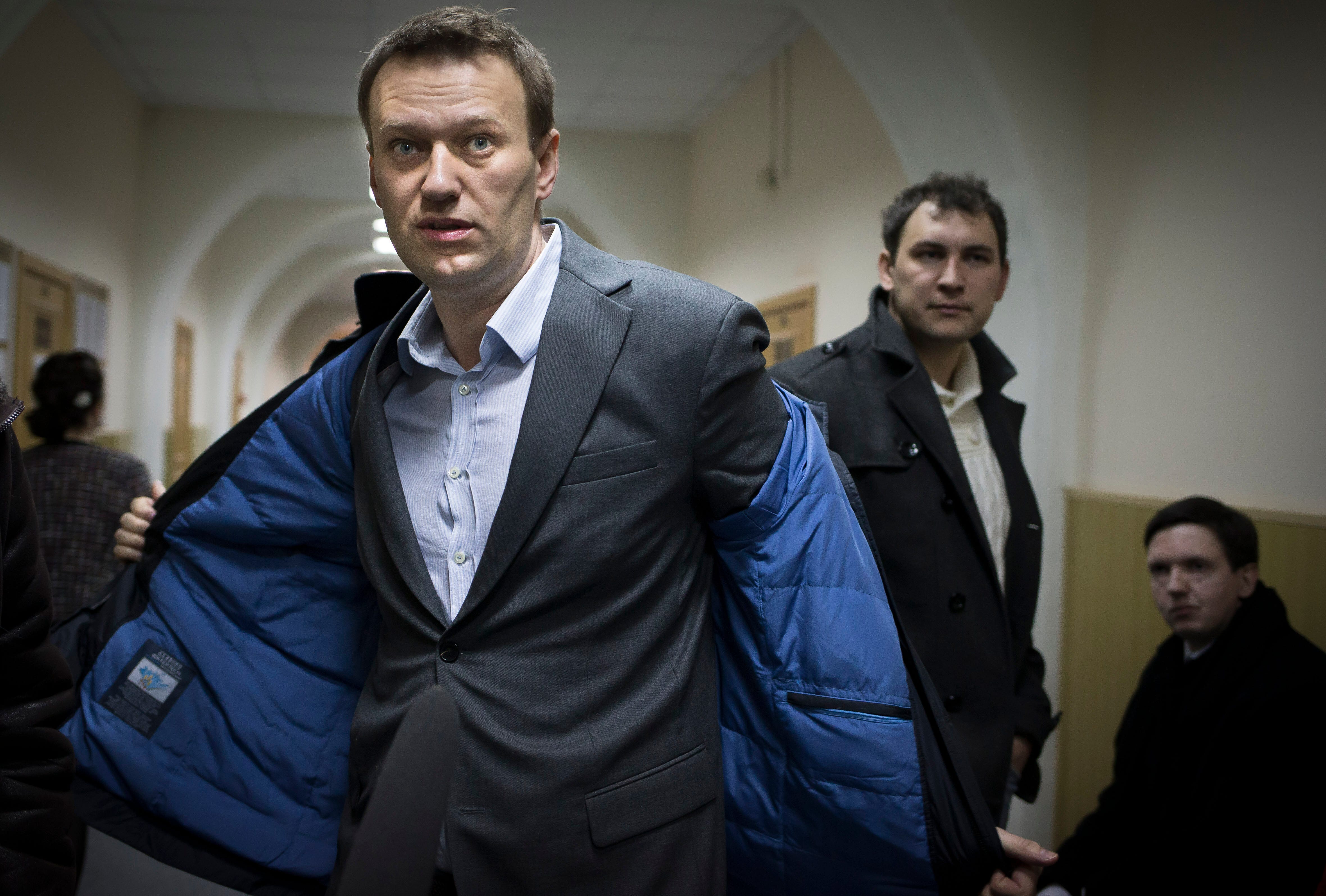 Navalny stands defiant as new extremism trial begins in Russia.