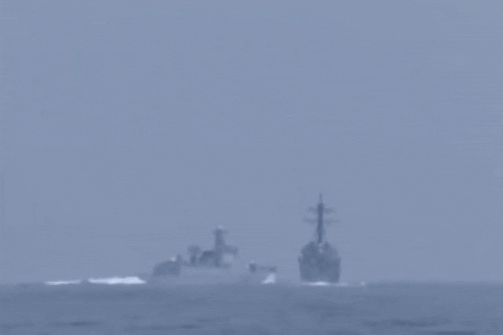 Chinese warship's close encounter with US destroyer in Taiwan Strait raises tensions.