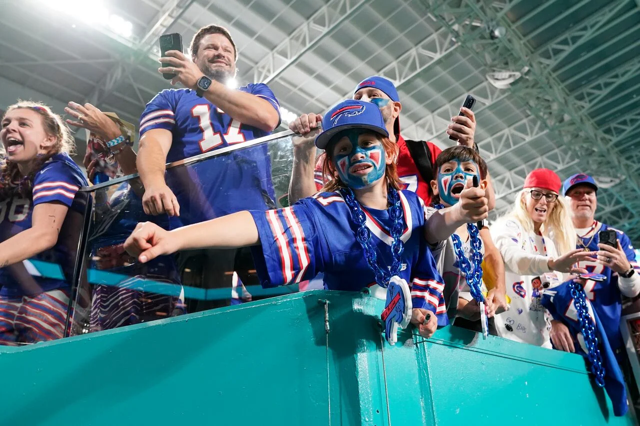 "Bills Mafia Celebrates AFC East Victory with Early Morning Airport Swarm"