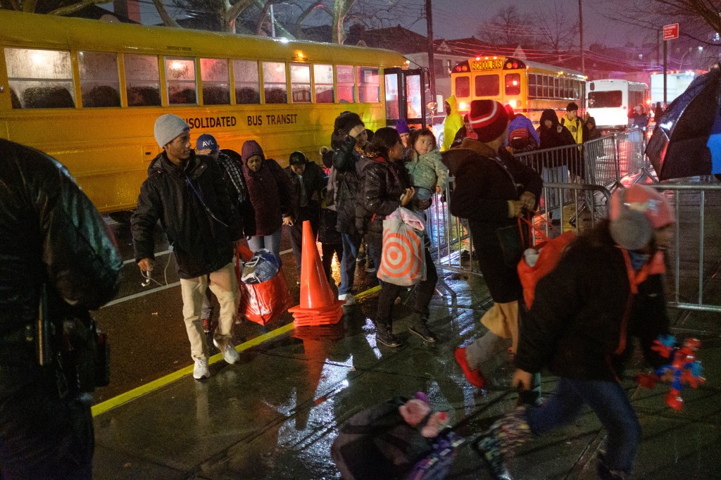 "Mass Evacuation of Migrants from Brooklyn's Floyd Bennett Field to High School Amid Shelter Crisis"