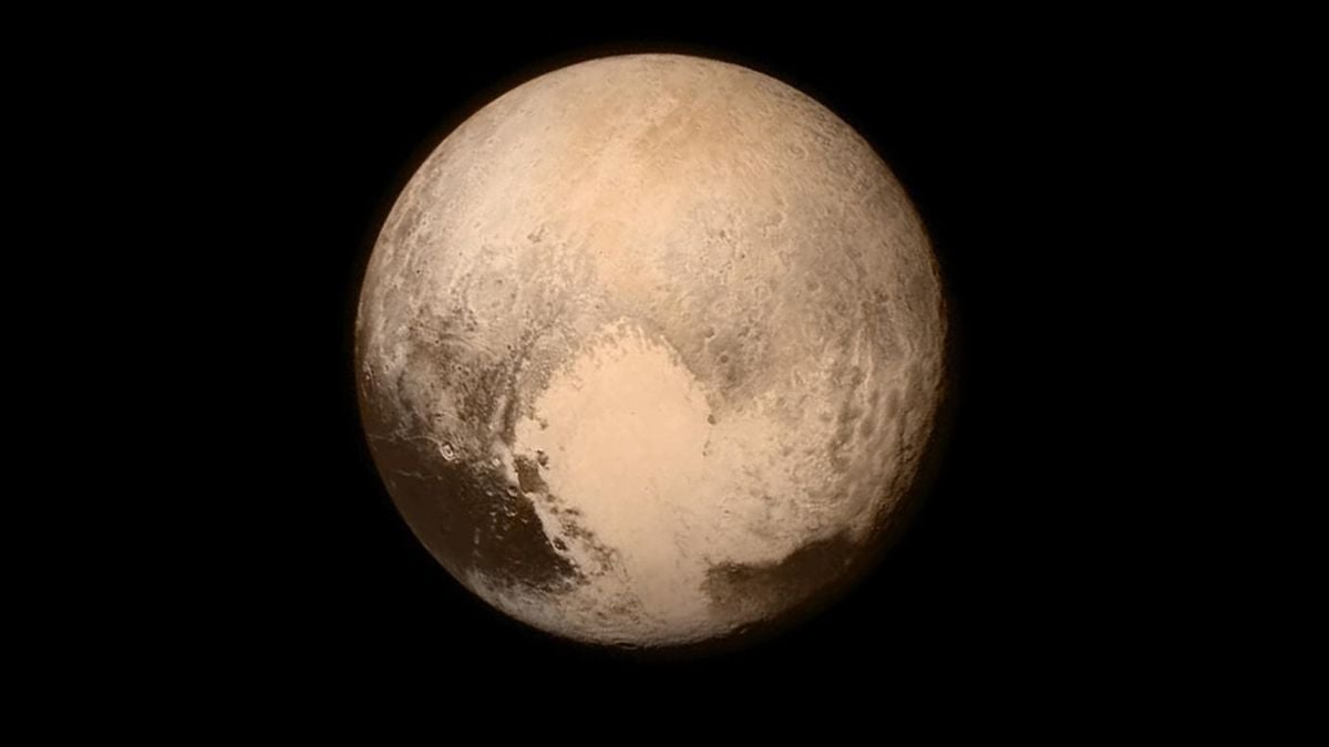 Featured image for "The Violent Origins of Pluto's Mysterious Heart Revealed by Astrophysicists"
