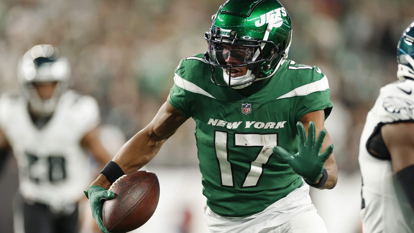 Featured image for "Garrett Wilson's Injury Update and Zach Wilson's Improved Accuracy: Insights from the New York Jets"