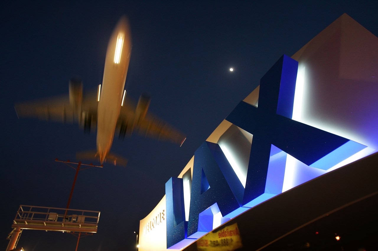 Police activity causes evacuation and traffic delays at LAX Terminal 1.
