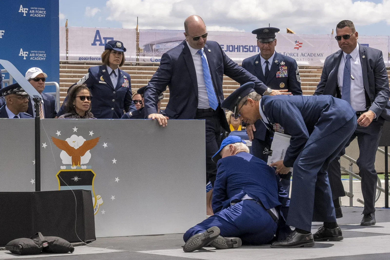 Biden trips and falls at Air Force graduation ceremony.
