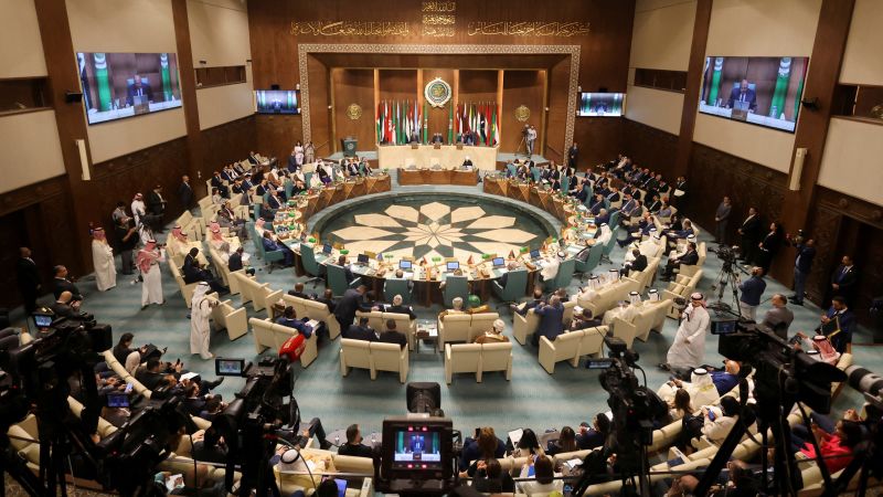 Syria readmitted to Arab League after 11-year absence.