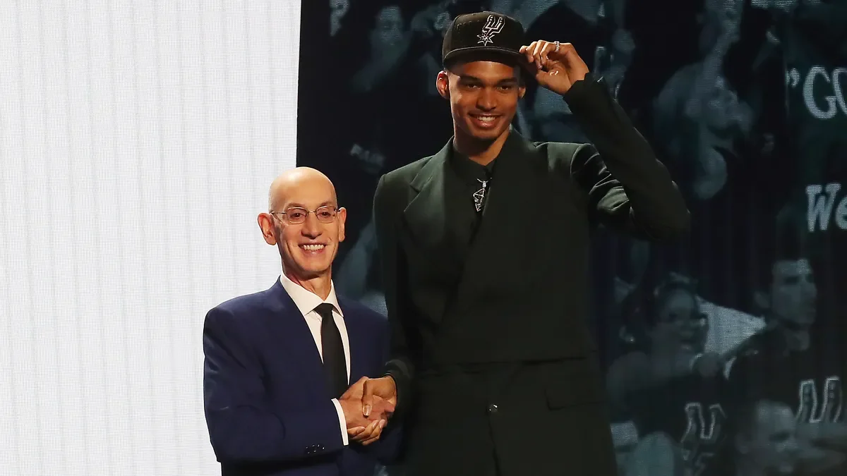 Wembanyama's Spurs debut creates buzz with legends and fans alike.