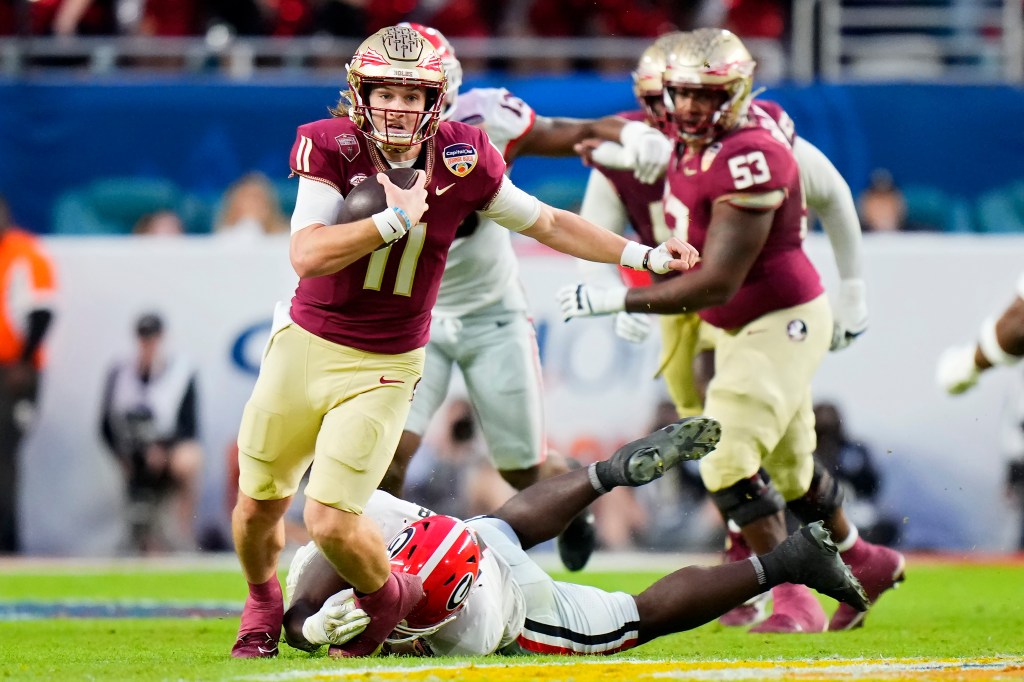 Featured image for "Georgia Triumphs as FSU Reflects on Orange Bowl Defeat and Opt-Out Controversy"